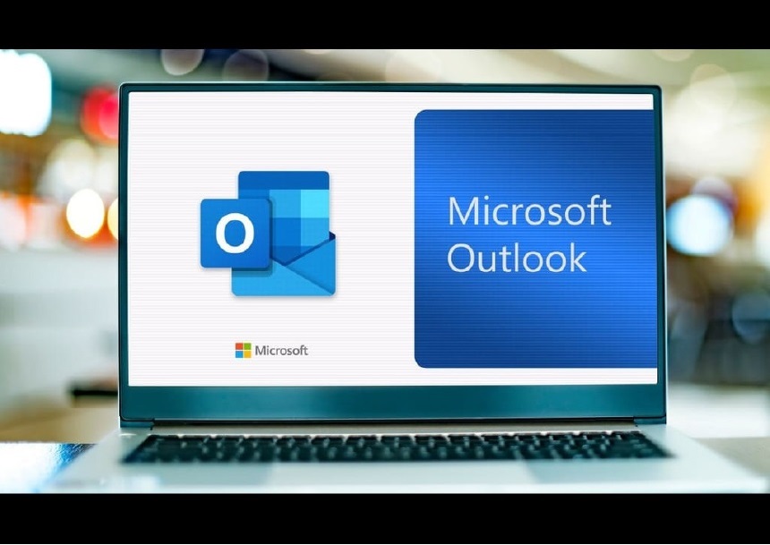 Outlook is displayed on a laptop screen.